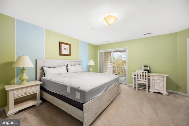 bedroom with visible vents, baseboards, and light colored carpet