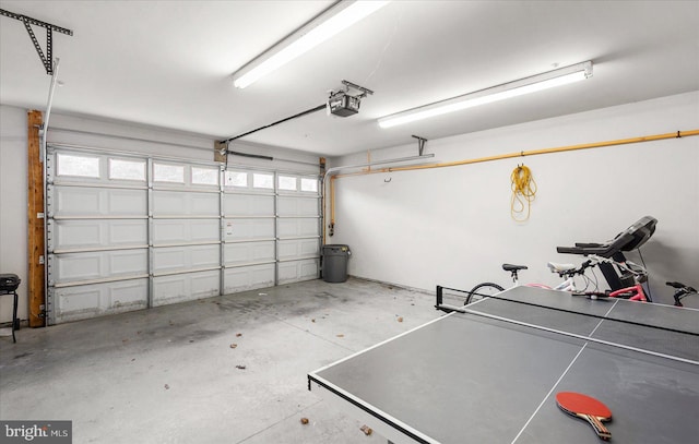 garage featuring a garage door opener