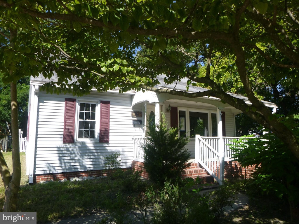 view of home's exterior with covered porch