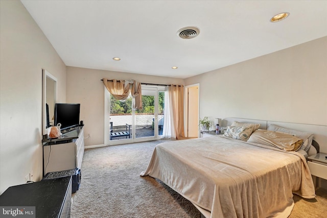 carpeted bedroom featuring access to exterior, recessed lighting, visible vents, and baseboards