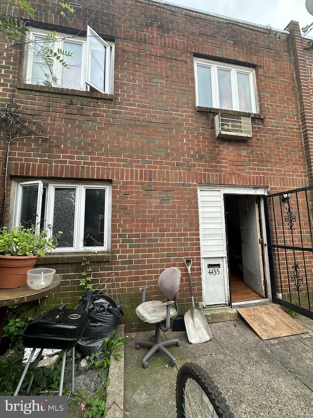 rear view of house featuring a patio