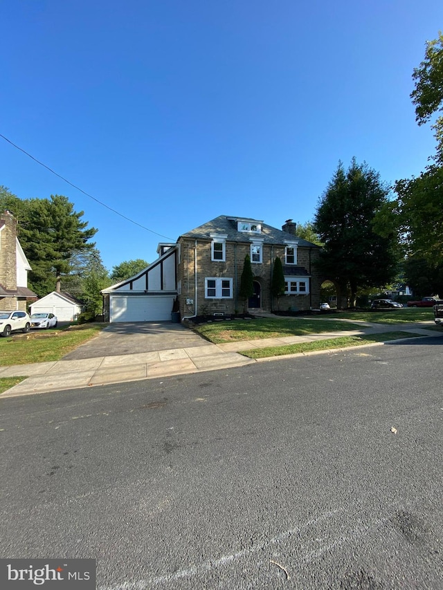 view of front of property with a garage