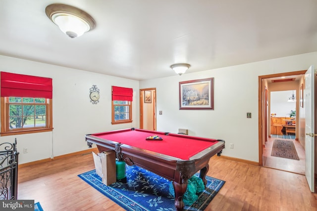 game room with pool table and hardwood / wood-style floors