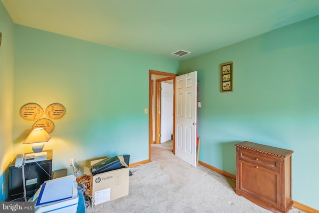 home office featuring light colored carpet