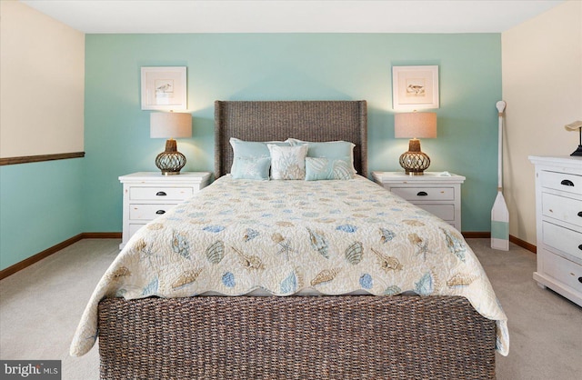 bedroom featuring light colored carpet