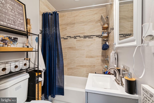 bathroom with toilet, vanity, and shower / bath combination with curtain