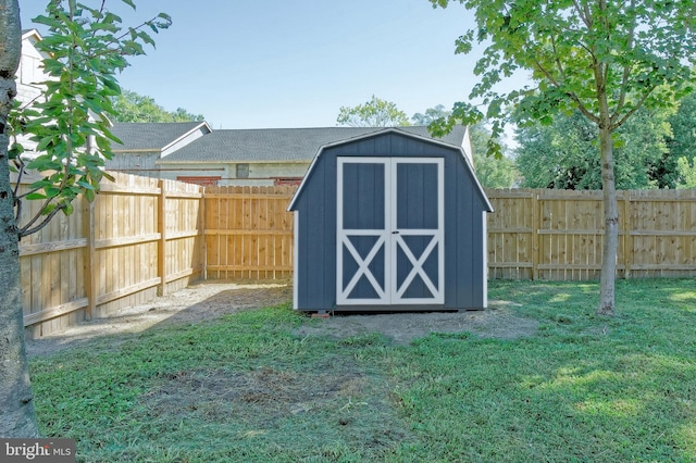 view of outdoor structure with a yard