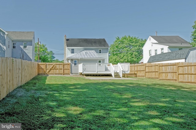 view of yard featuring a deck