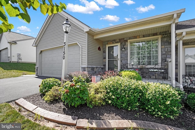 single story home featuring a garage