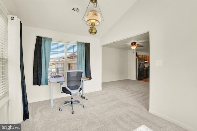 office with lofted ceiling, light colored carpet, and ceiling fan