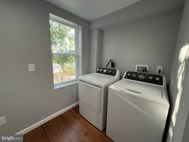 220 Montford Ave N, Baltimore, MD 21224 - clothes washing area featuring washer and dryer, laundry area, dark wood finished floors, and baseboards