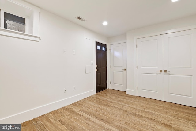 unfurnished bedroom featuring light hardwood / wood-style flooring