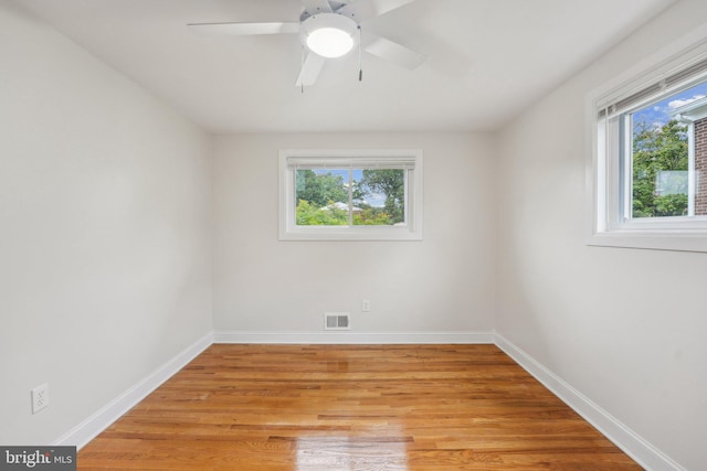 unfurnished room featuring ceiling fan and light hardwood / wood-style floors