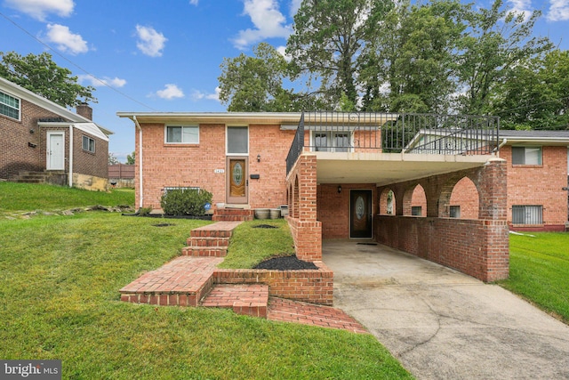 view of front of property with a front yard and a carport