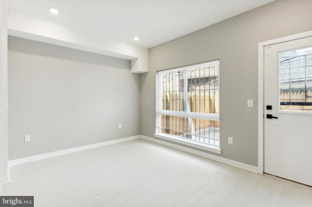 doorway to outside with light hardwood / wood-style flooring