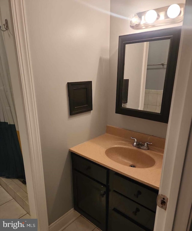 bathroom with vanity and tile patterned floors