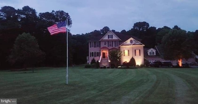 view of front facade with a front lawn