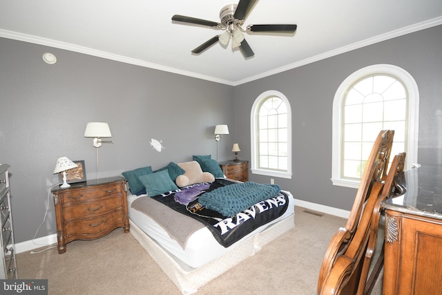 bedroom with ceiling fan, light colored carpet, and ornamental molding