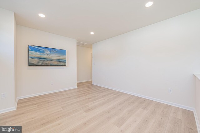 empty room with light wood-type flooring