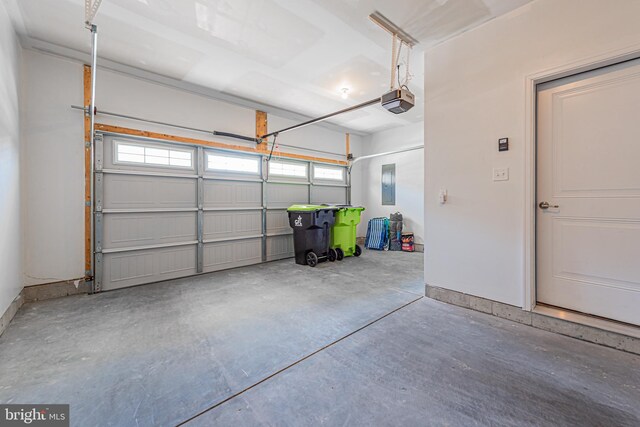 garage featuring a garage door opener