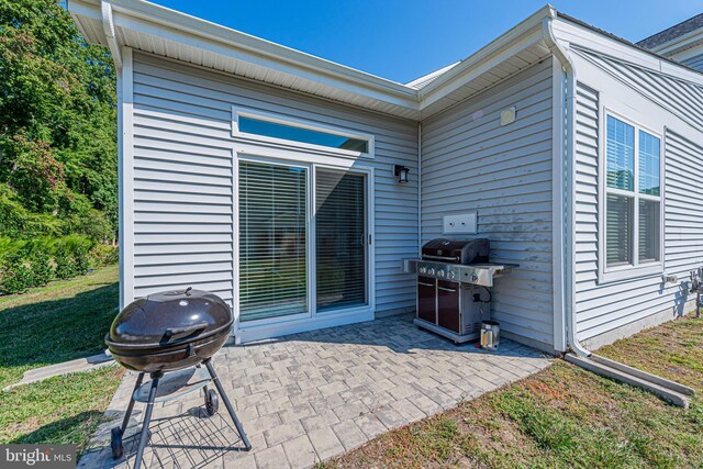 view of patio with a grill