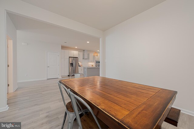 dining area featuring light hardwood / wood-style flooring