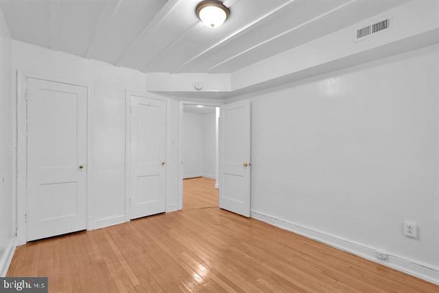 unfurnished bedroom with light hardwood / wood-style floors