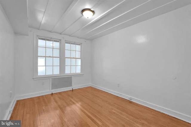 empty room with light wood-type flooring