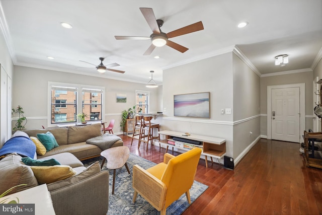 living room featuring ceiling fan, ornamental molding, and dark hardwood / wood-style flooring