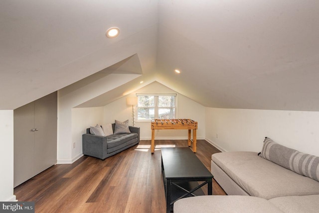 interior space featuring dark hardwood / wood-style floors and vaulted ceiling