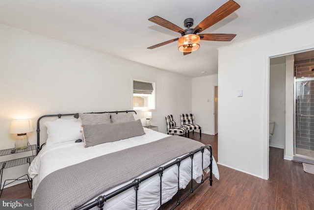 bedroom featuring dark wood-type flooring, ceiling fan, and crown molding