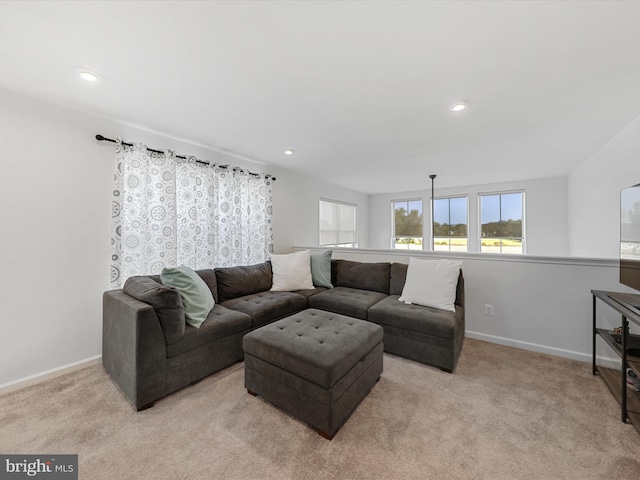 living room with light colored carpet