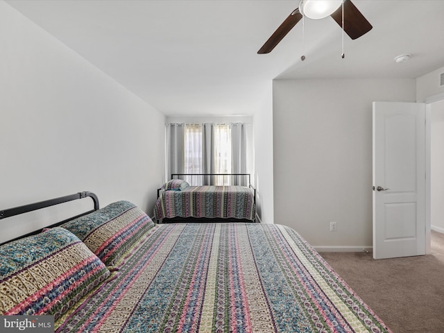 bedroom with carpet flooring and ceiling fan