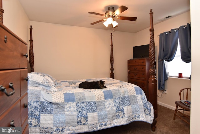 bedroom featuring ceiling fan and carpet