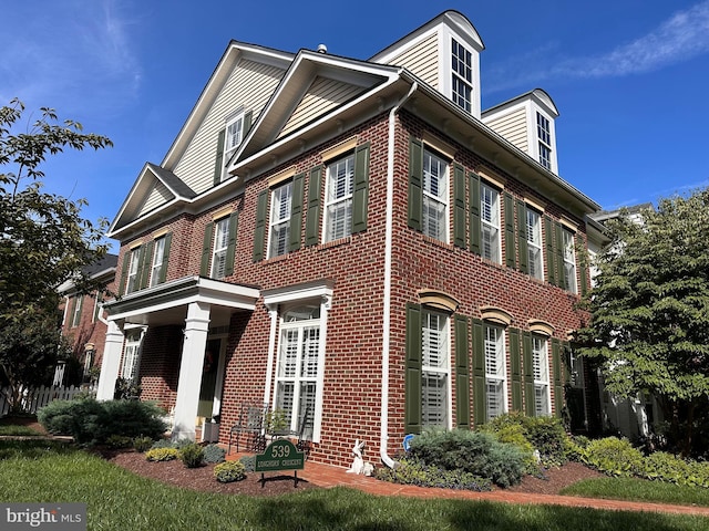 view of front of property with brick siding