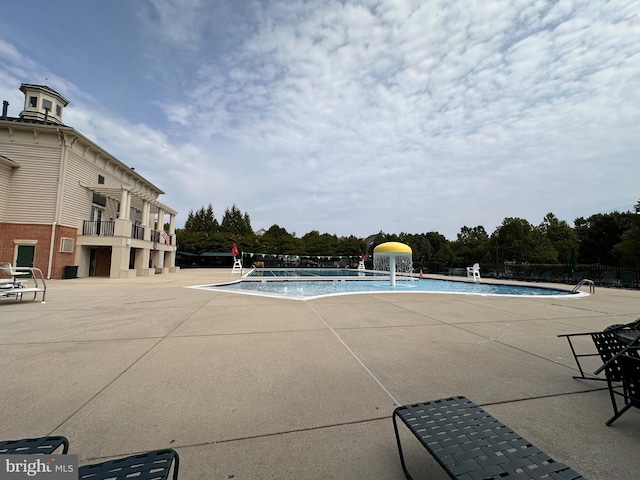 pool featuring a patio area