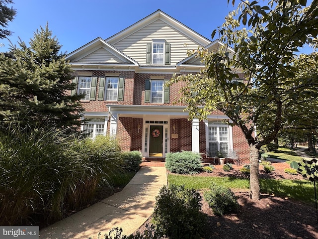 view of front of home with brick siding