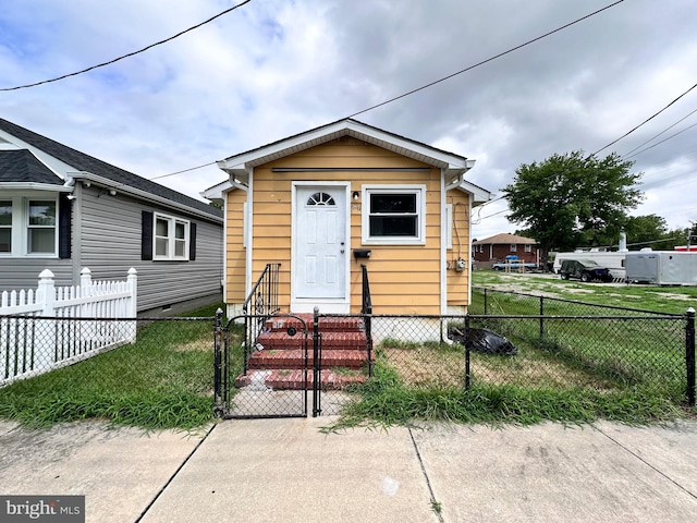 bungalow with a front lawn