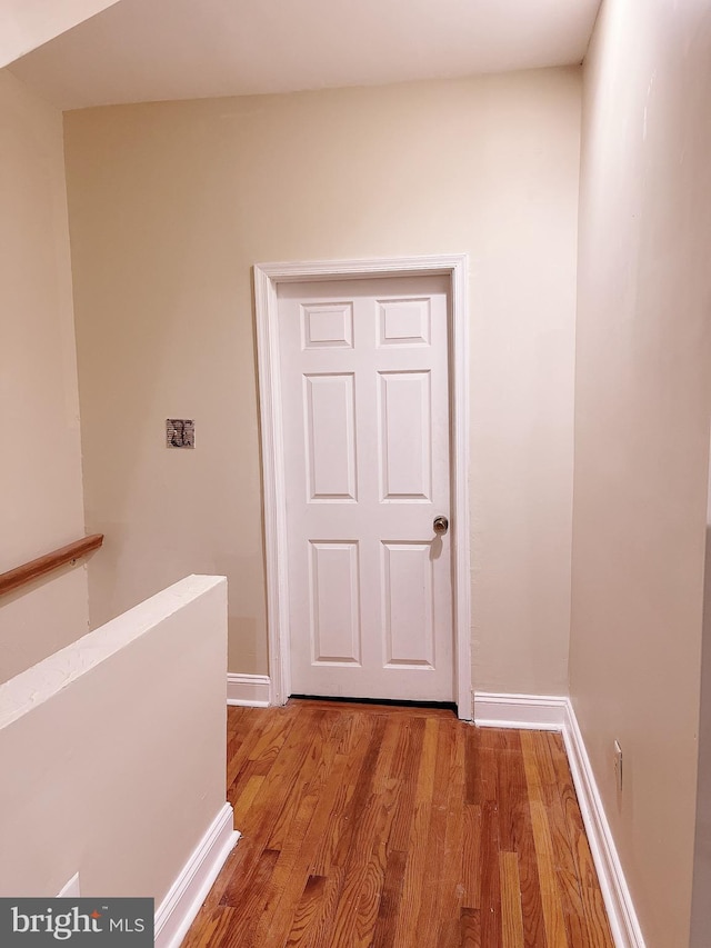 hallway featuring light hardwood / wood-style flooring