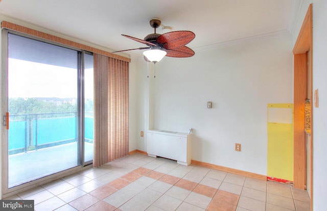 unfurnished room with ceiling fan, ornamental molding, and light tile patterned floors