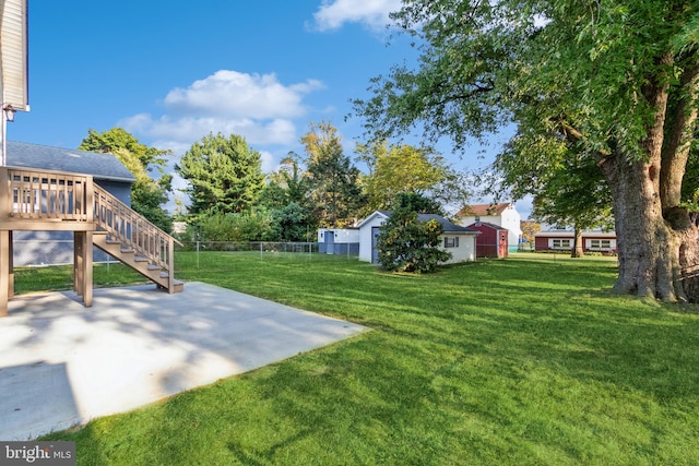 view of yard with a patio and a deck