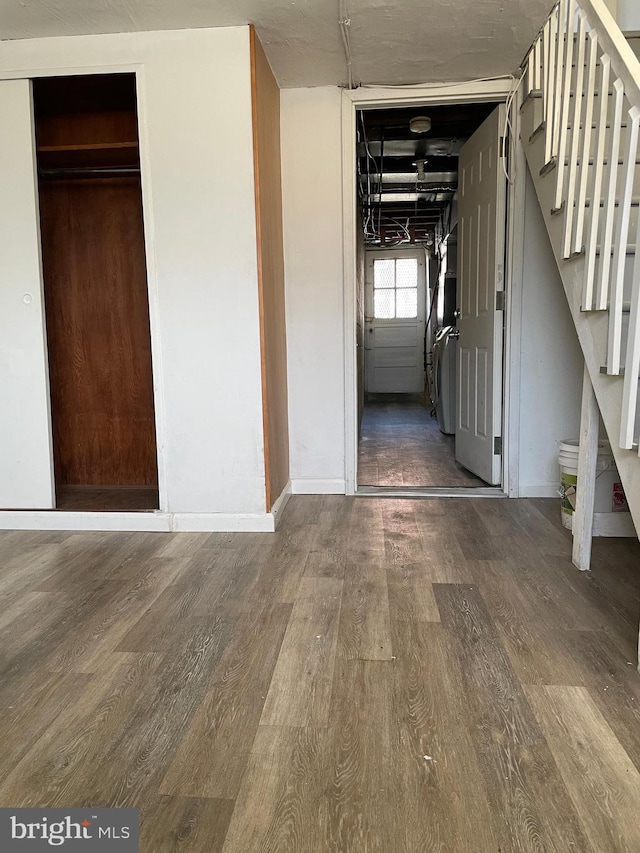 interior space with dark wood-type flooring