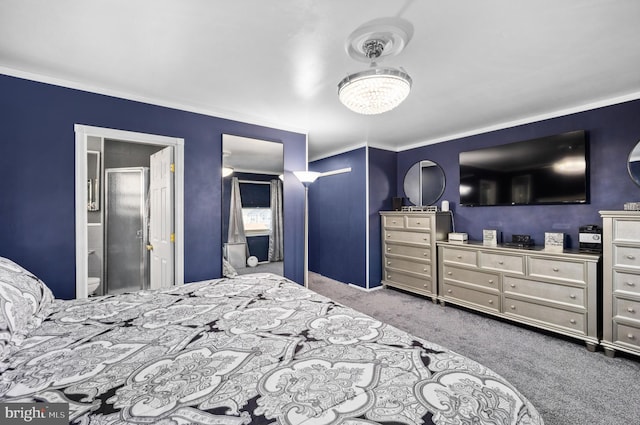 carpeted bedroom featuring ensuite bath and crown molding