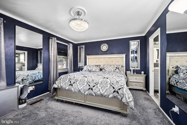 carpeted bedroom featuring crown molding