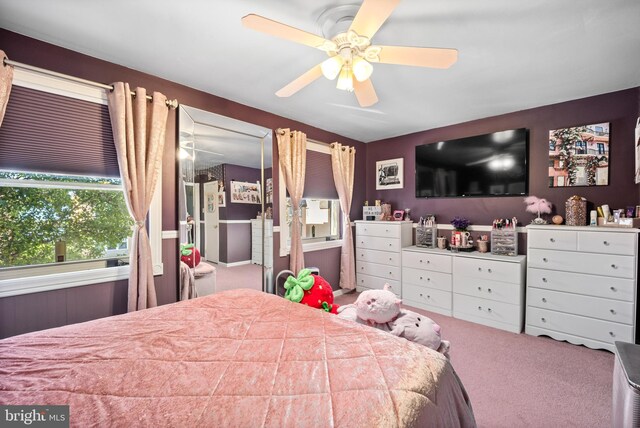 bedroom featuring ceiling fan and carpet flooring