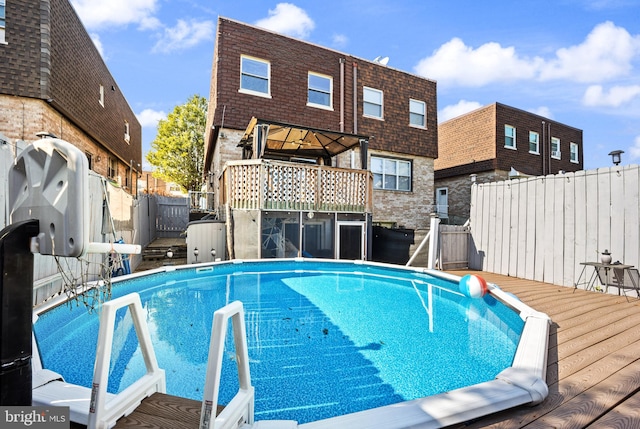 view of pool featuring a deck