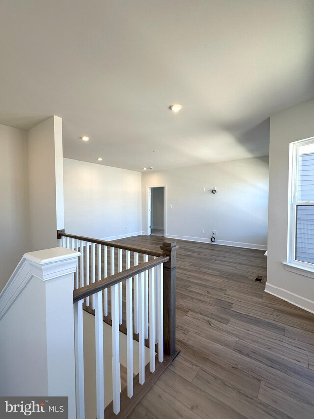 interior space with dark hardwood / wood-style floors