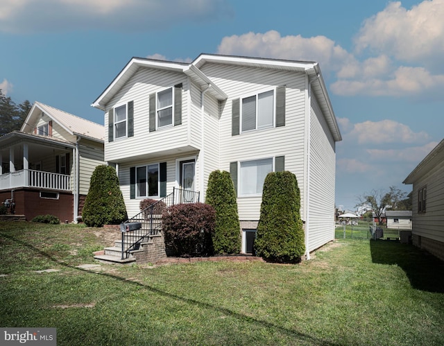 view of front of home featuring a front lawn