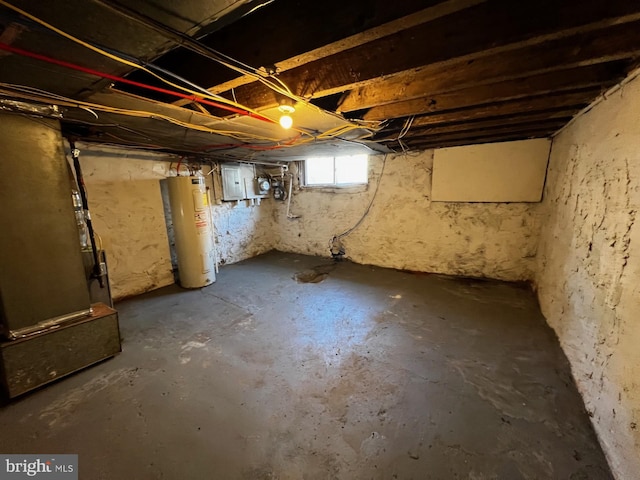 basement with gas water heater and electric panel