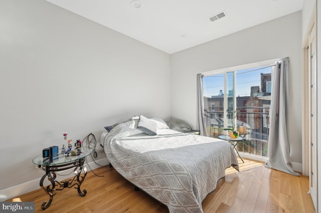 bedroom featuring light hardwood / wood-style floors